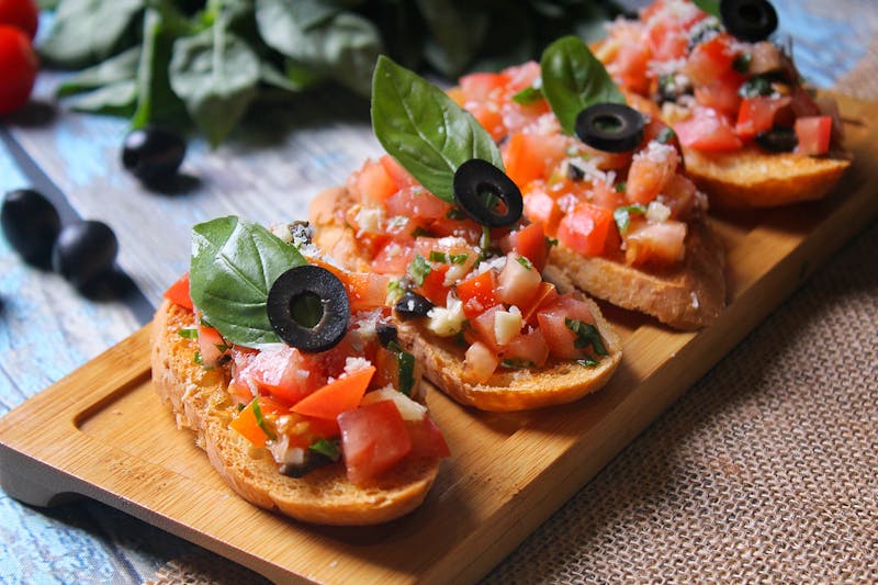 Bruschetta with fresh tomatoes, basil, and olive oil