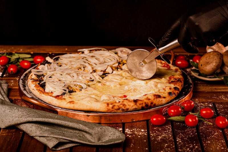 BBQ chicken pizza with red onion, cilantro, and smoked gouda